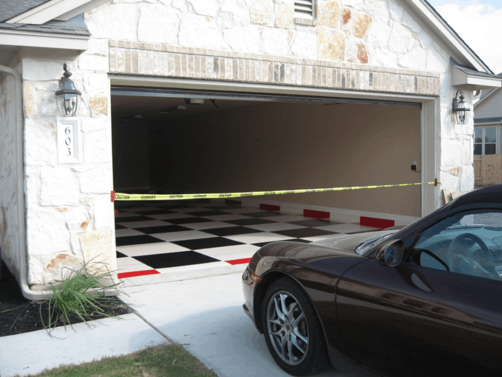 Beautiful check designed epoxy flooring of a luxury car garage