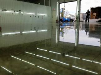 Reflactive epoxy coating installed on a big commercial garage