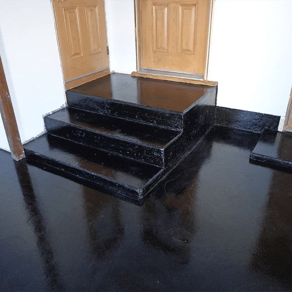 Black epoxy coating installed on frontyard floor