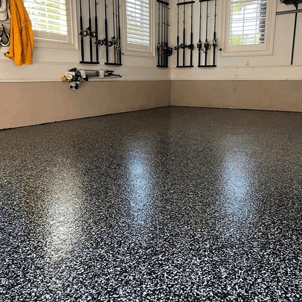 black chip epoxy flooring installed in a residential house, San Antonio TX