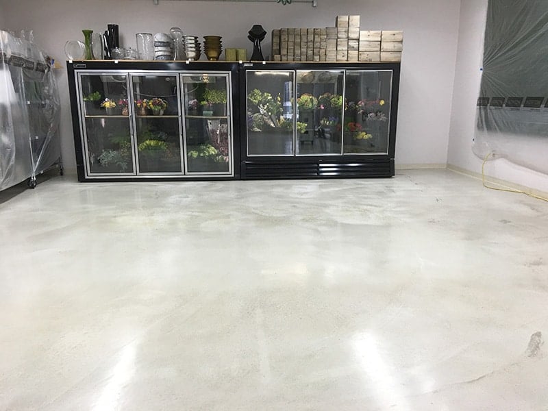 White solid epoxy coated on a retail shop floor