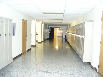 Beautiful chip and shiny epoxy coated floor of a school hallway