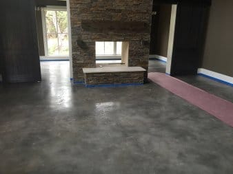 Modern stained epoxy coated floor on a concrete floor of a residential house