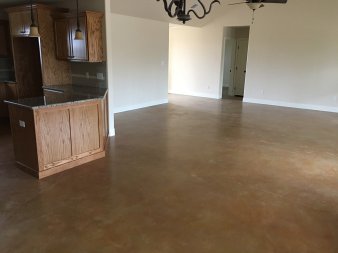 Solid brown stained epoxy coated on a concrete floor, San Antonio