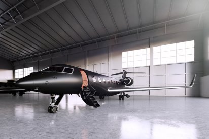 Shiny and reflactive epoxy coated floor of a private airport hanger