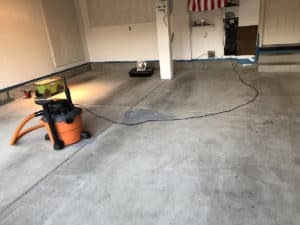 Preparing a garage floor to refinish epoxy coating