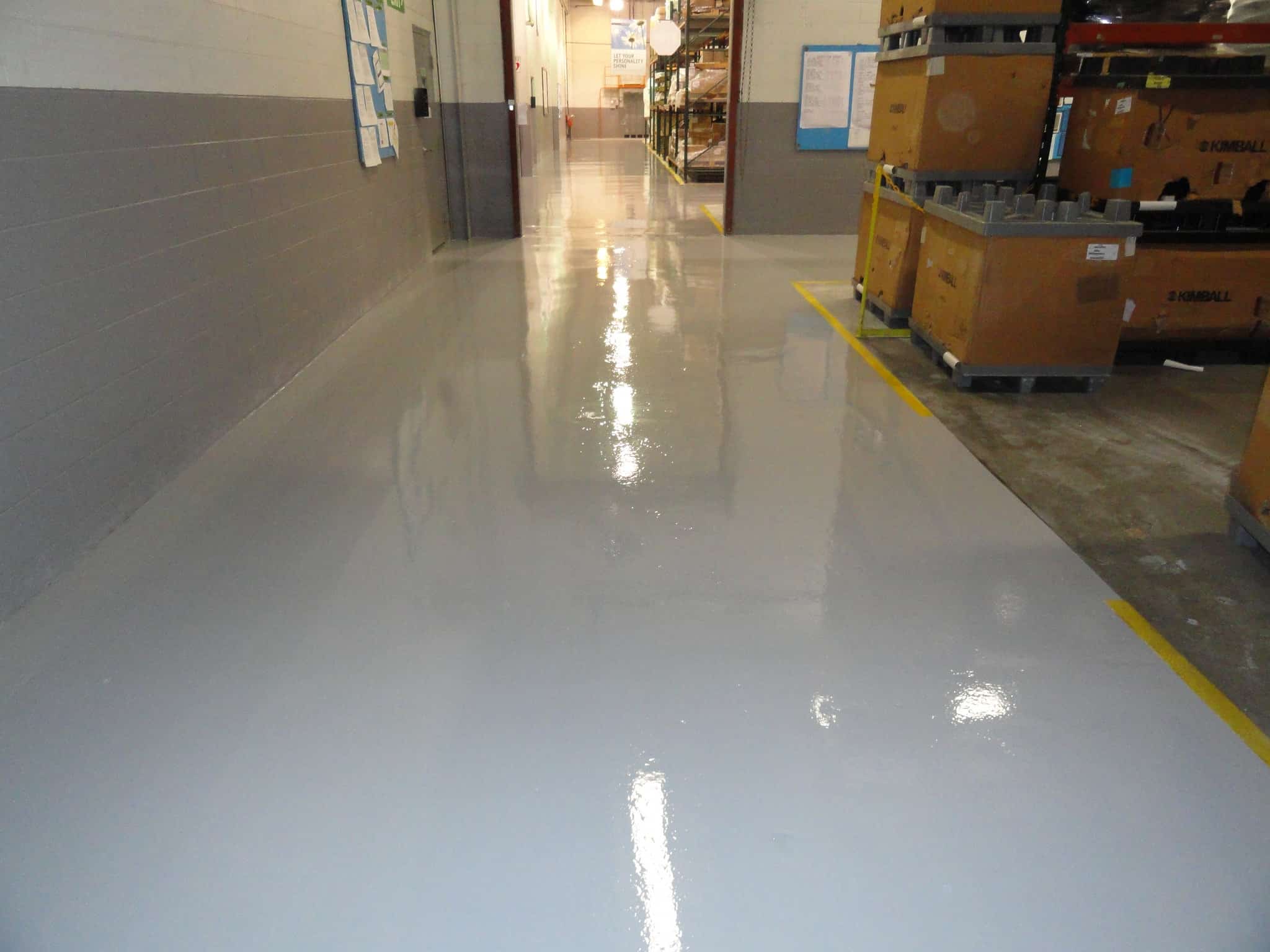Gray solid epoxy coated in a industrial storage facility floor