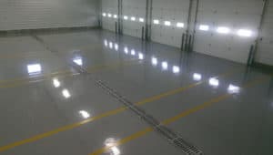 Yellow striped reflactive garage floor of a big commercial space