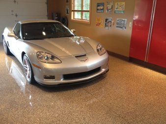 Beautiful chip epoxy flooring in garage of a residential house