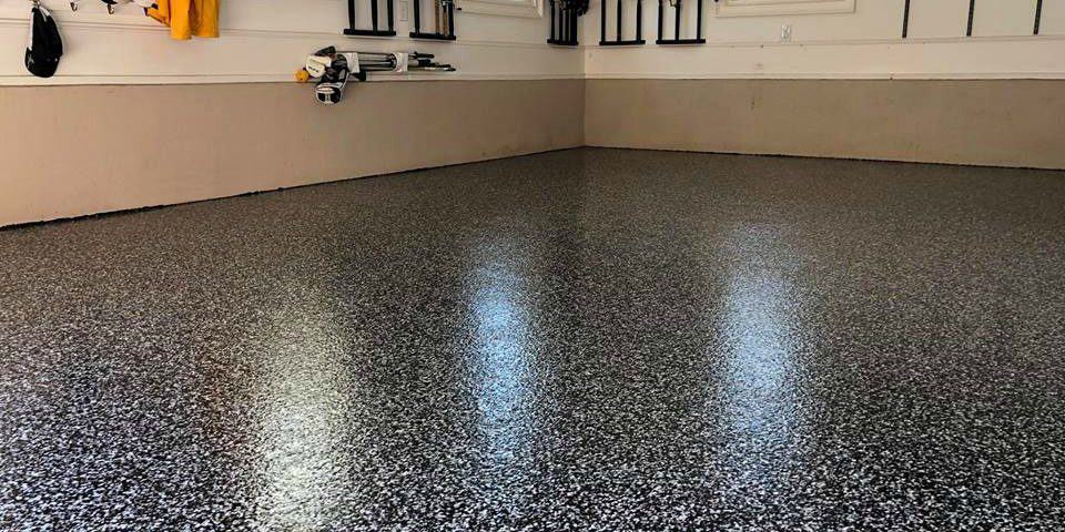 black chip epoxy flooring installed in a residential house