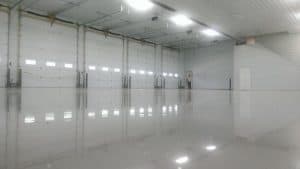 Solid reflactive epoxy flooring sinatlled in a commercial garage, San Antonio