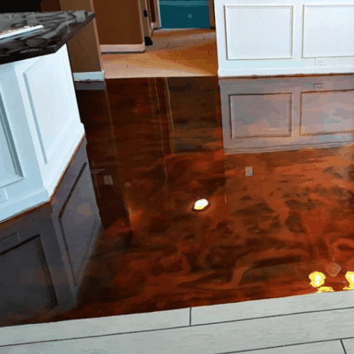 Shiny brown epoxy coating on a kitchen floor