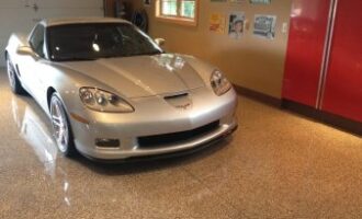 Beautiful chip epoxy flooring in garage of a residential house