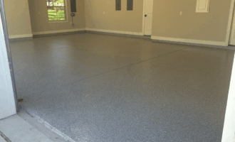 Chip epoxy coated on a square concrete floor of a residential house