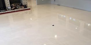 Shiny and reflactive white epoxy coated floor of a residential house